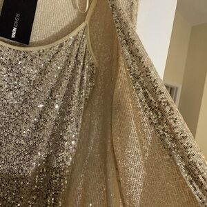 Fashion, nova two-piece gold sequin cat suit with duster. Never worn.